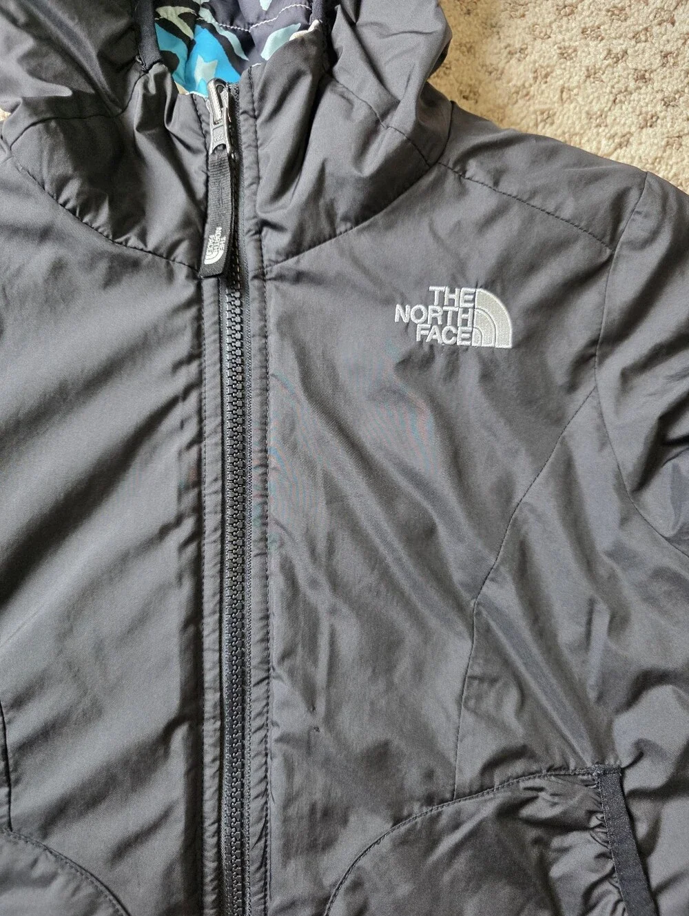 The North Face Girls' Reversible Blue Patterned And Black Puffer Jacket